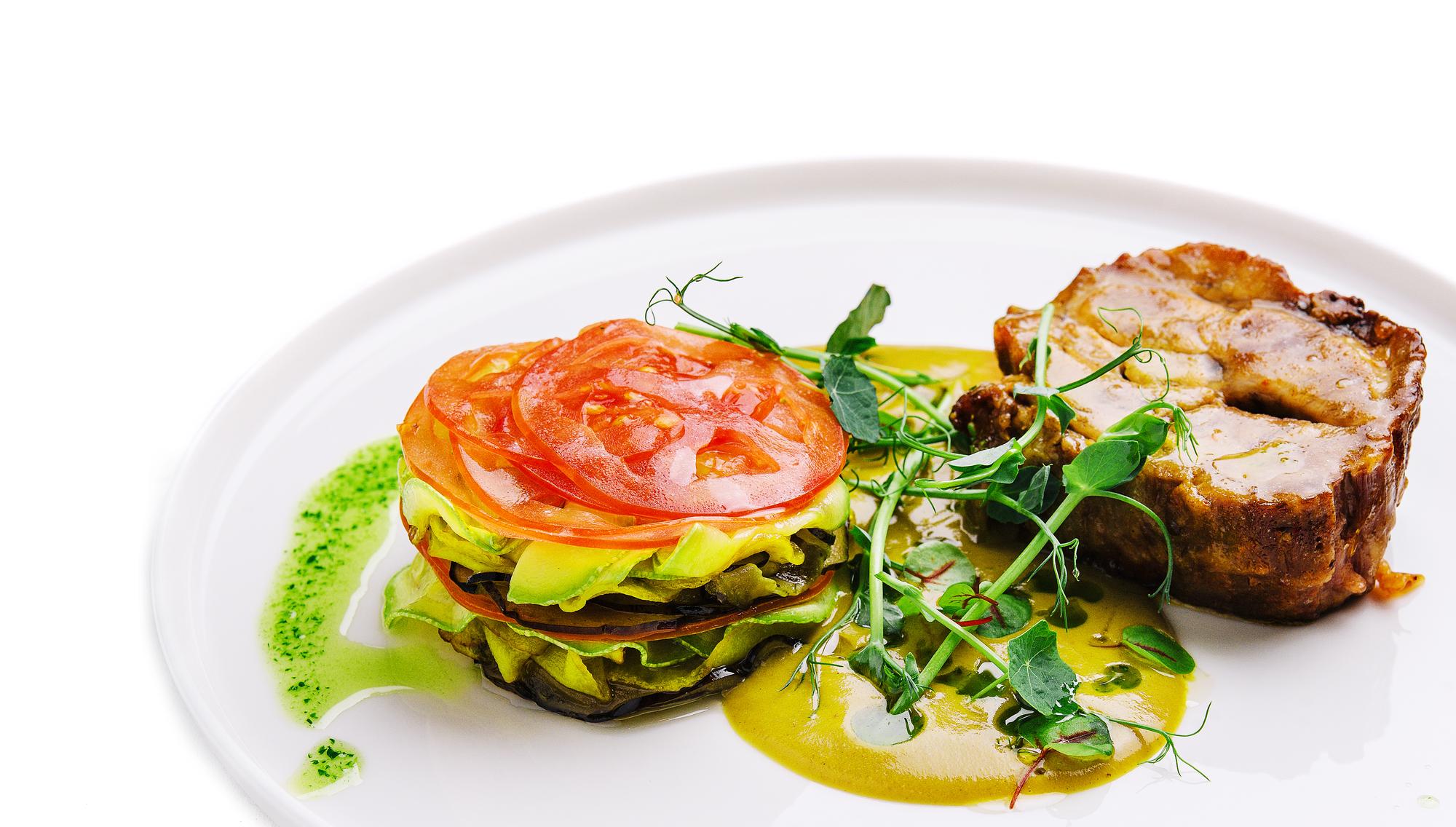 Large close-up of plated meal with modern plating